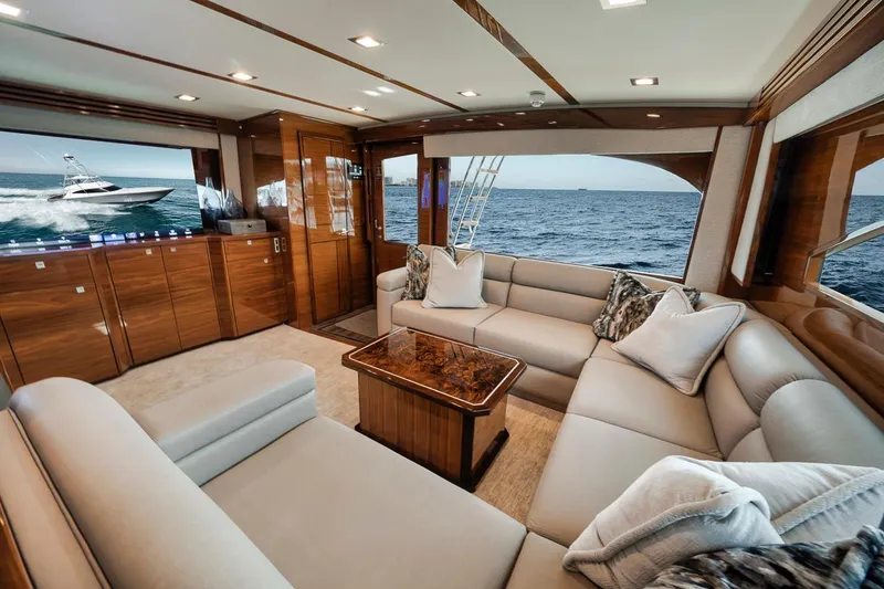 Slide: The Image of Luxurious interior of 2023 Viking 72 Convertible yacht with ocean view. - 25
