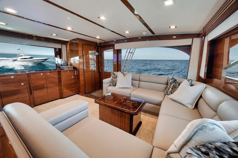 Slide: The Image of Luxurious interior of 2023 Viking 72 Convertible yacht with ocean view. - 27