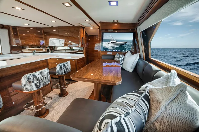 Slide: The Image of Luxurious interior of 2023 Viking 72 Convertible yacht with ocean view. - 35
