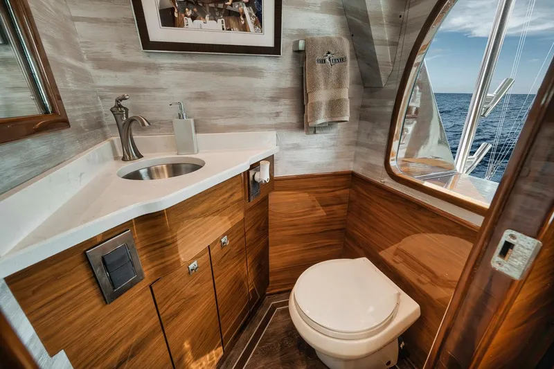 Slide: The Image of Luxurious bathroom interior of 2023 Viking 72 Convertible yacht with ocean view. - 37