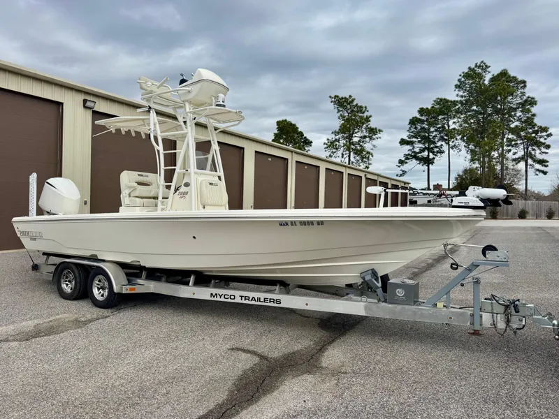 Slide: The Image of 2019 Pathfinder 2600 HPS boat on Myco trailer, parked outdoors. - 1