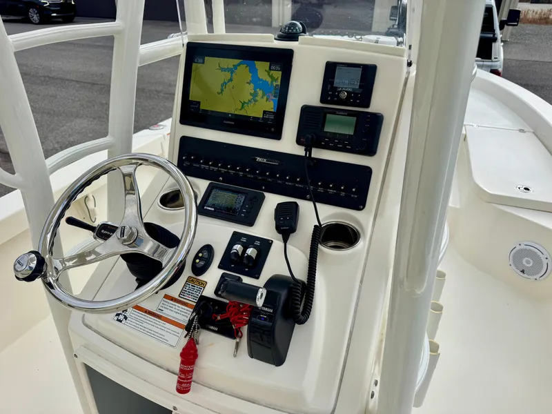 Slide: The Image of 2019 Pathfinder 2600 HPS boat console with navigation and control systems. - 12