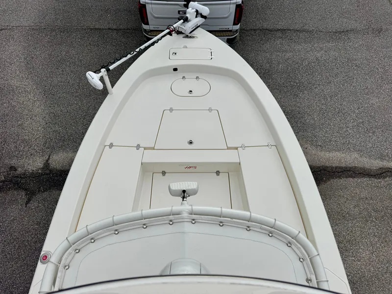Slide: The Image of 2019 Pathfinder 2600 HPS boat, aerial view showing deck and trolling motor. - 14