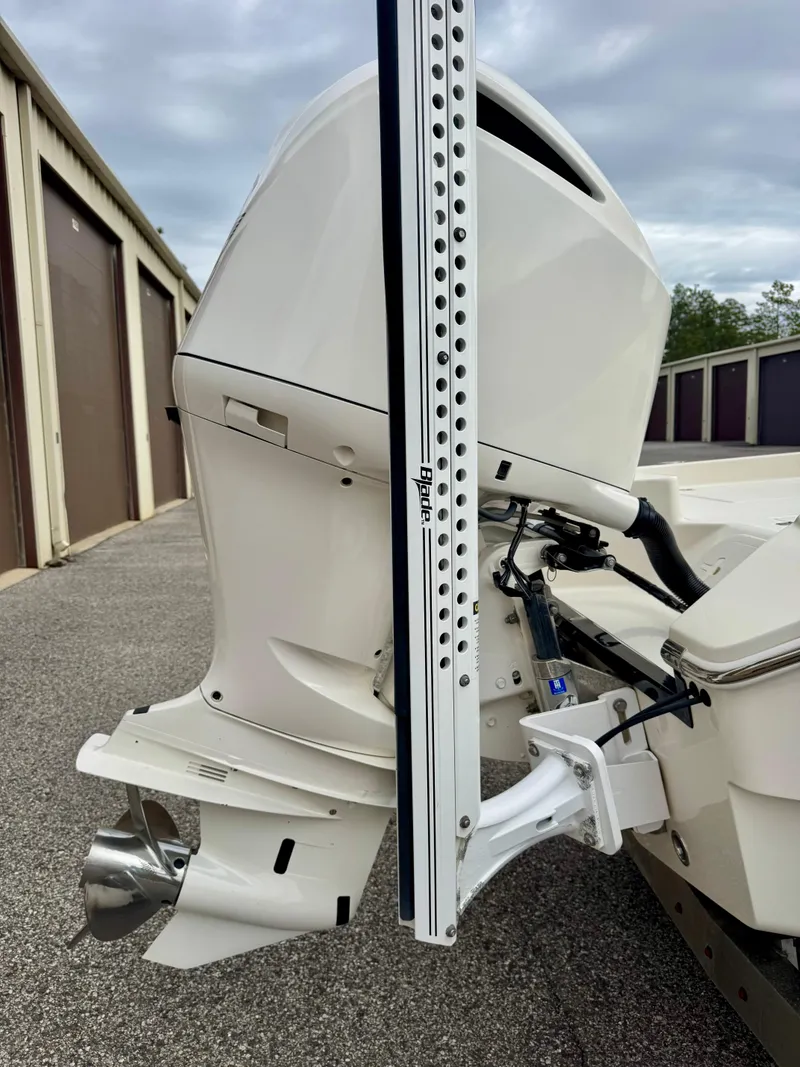 Slide: The Image of 2019 Pathfinder 2600 HPS boat engine and power pole in storage area. - 5