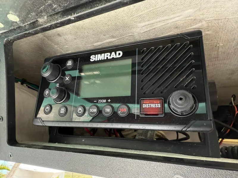 Slide: The Image of Simrad marine radio installed on a 2021 Caymas 26 HB boat. - 26