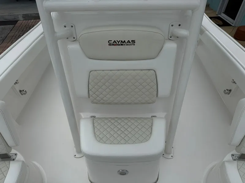 Slide: The Image of 2021 Caymas 26 HB boat seat with quilted white upholstery. - 38