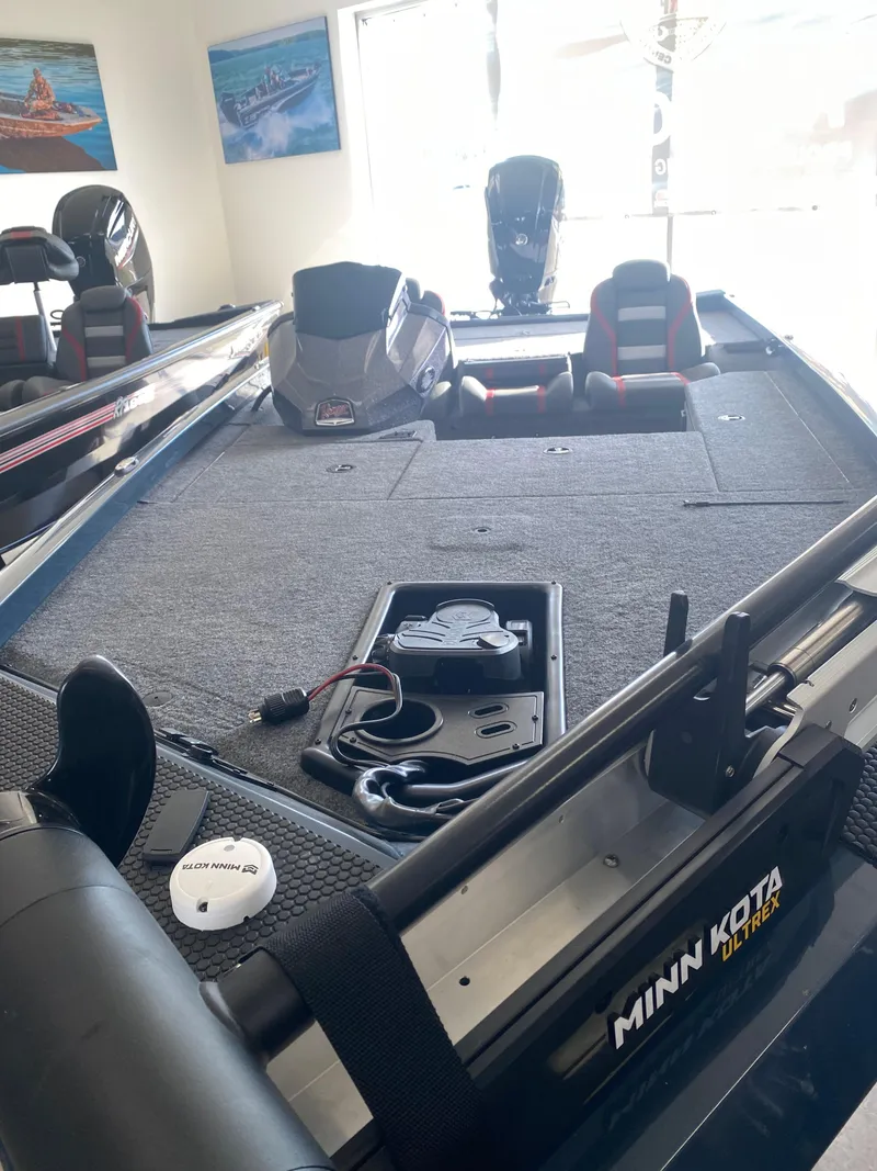 Slide: The Image of 2024 Ranger RT178 boat interior with Minn Kota trolling motor, spacious deck, and dual seats. - 3