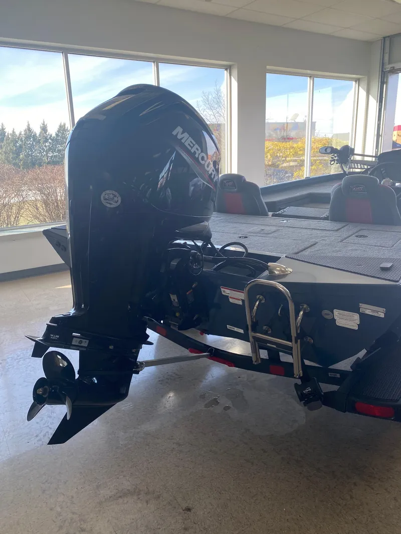 Slide: The Image of 2024 Ranger RT178 boat with Mercury outboard motor in showroom. - 4