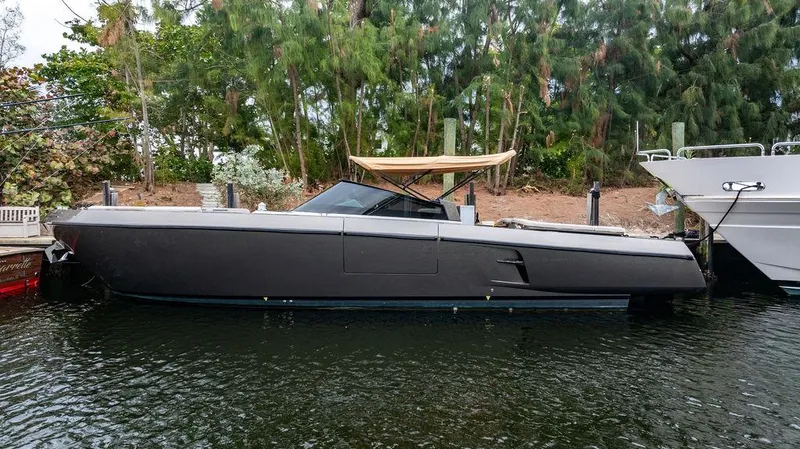 The Image of 2015 CNM 43 Continental yacht docked by lush greenery. - 1