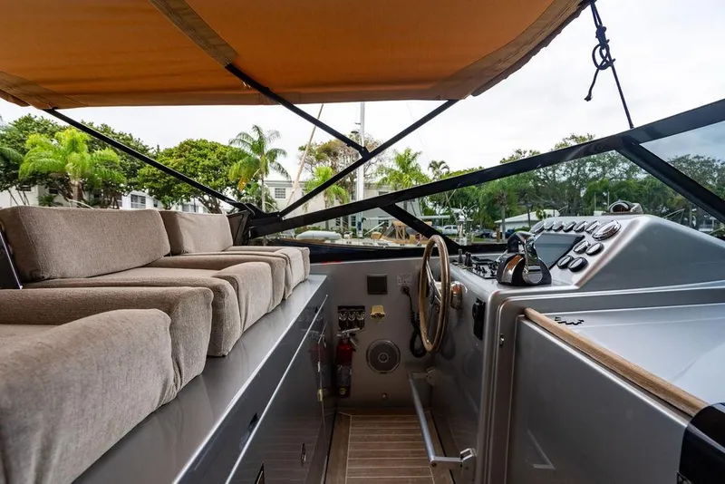 Slide: The Image of Luxurious 2015 CNM 43 Continental yacht interior with plush seating and modern controls. - 11