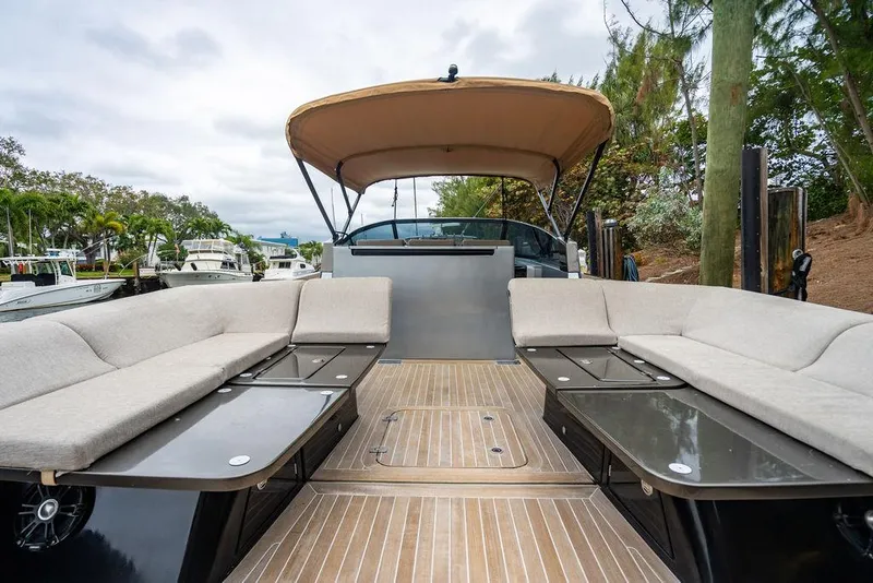 Slide: The Image of 2015 CNM 43 Continental yacht with spacious deck and seating area. - 14