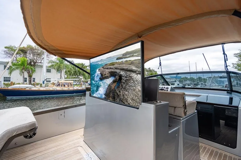 Slide: The Image of Luxurious 2015 CNM 43 Continental yacht interior with TV and canopy. - 18