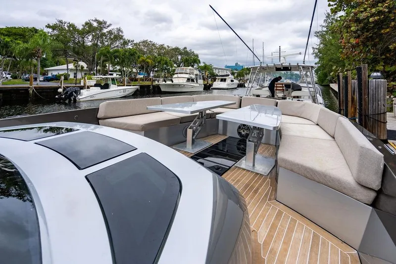 Slide: The Image of Luxurious 2015 CNM 43 Continental yacht with spacious deck and modern seating area. - 19