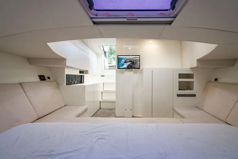 Slide: The Image of Luxurious interior of 2015 CNM 43 Continental yacht with modern furnishings and a skylight. - 22