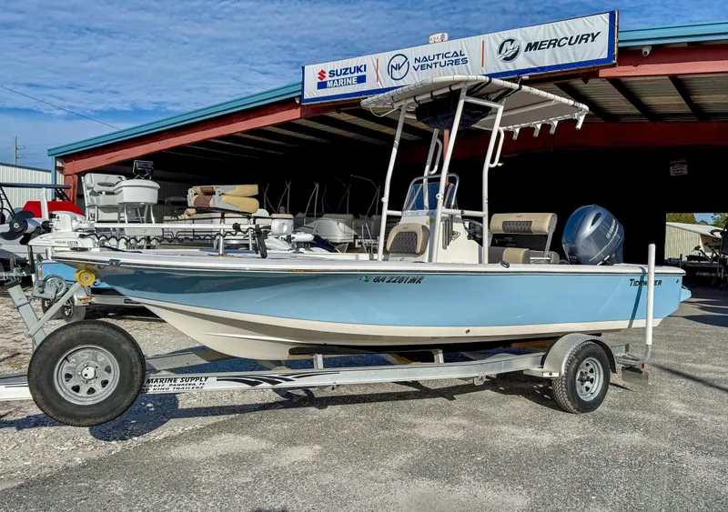 Slide: The Image of 2018 Tidewater 1910 Bay Max boat on trailer, displayed at dealership. - 1