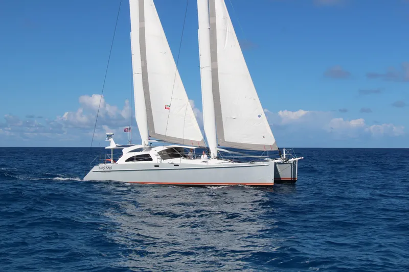 Slide: The Image of Sailing catamaran Chris White Atlantic 49 MastFoil 2018 on open ocean. - 1