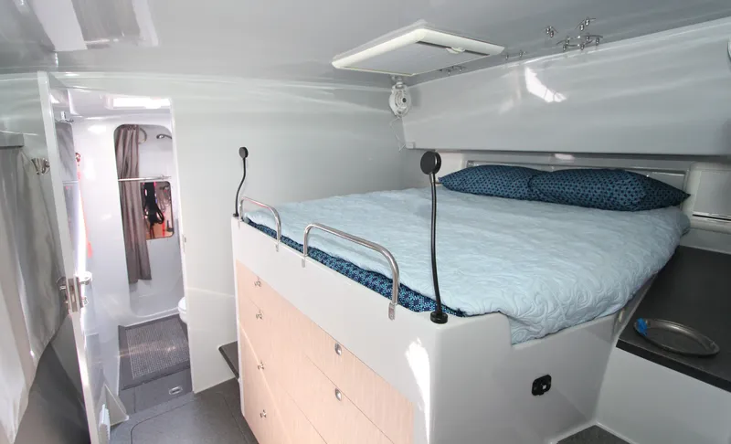 Slide: The Image of Cozy cabin interior of 2018 Chris White Atlantic 49 MastFoil yacht with bed and storage. - 13