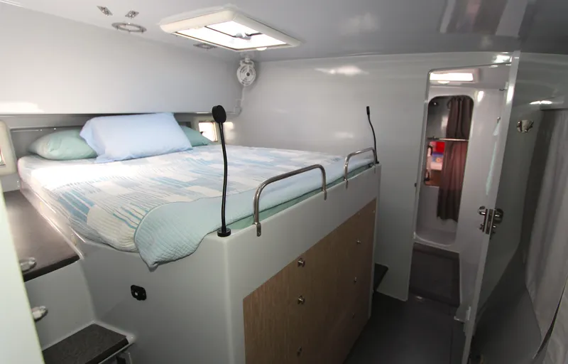 Slide: The Image of Cozy cabin interior of 2018 Chris White Atlantic 49 MastFoil yacht with elevated bed. - 15