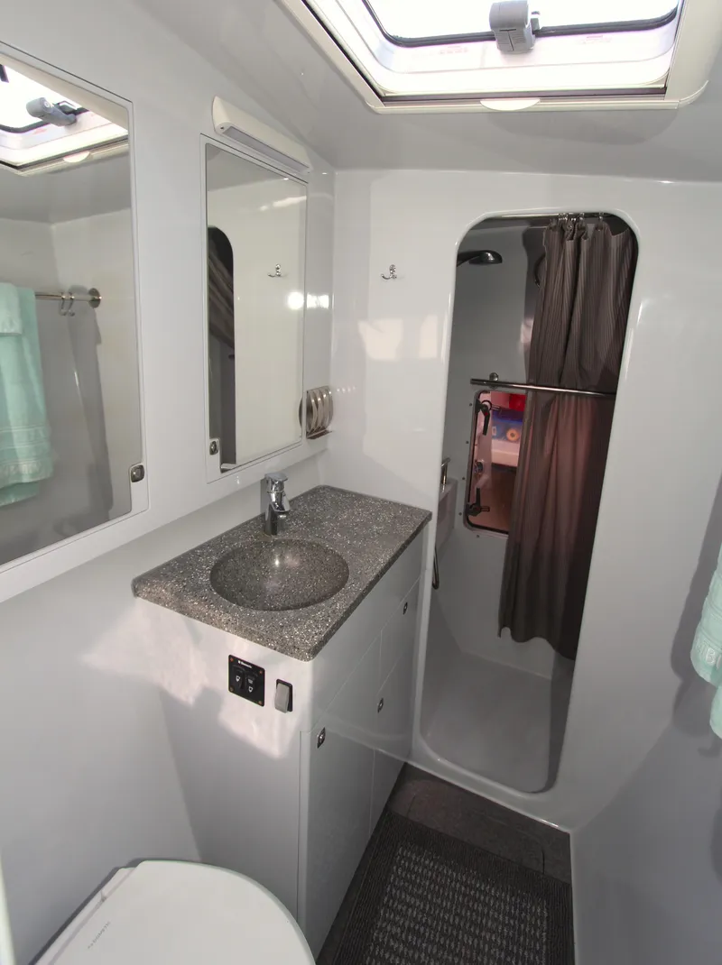 Slide: The Image of Modern bathroom in 2018 Chris White Atlantic 49 MastFoil yacht, featuring sleek design and amenities. - 17