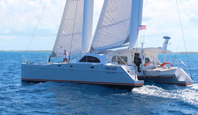 Slide: The Image of Sailing catamaran Chris White Atlantic 49 MastFoil, 2018, cruising on blue ocean waters. - 2