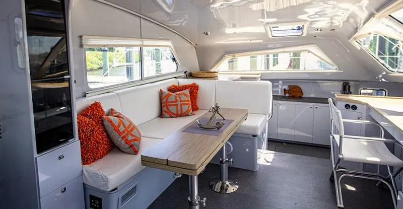 Slide: The Image of Luxurious interior of 2018 Chris White Atlantic 49 MastFoil yacht with modern seating and decor. - 6