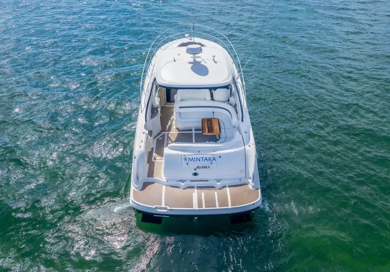 Slide: The Image of 2007 Sea Ray 44 Sundancer yacht on open water, rear view. - 3