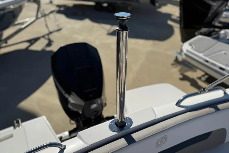 Slide: The Image of 2025 Hurricane SunDeck 235 OB boat with outboard motor and stainless steel ski tow bar. - 15