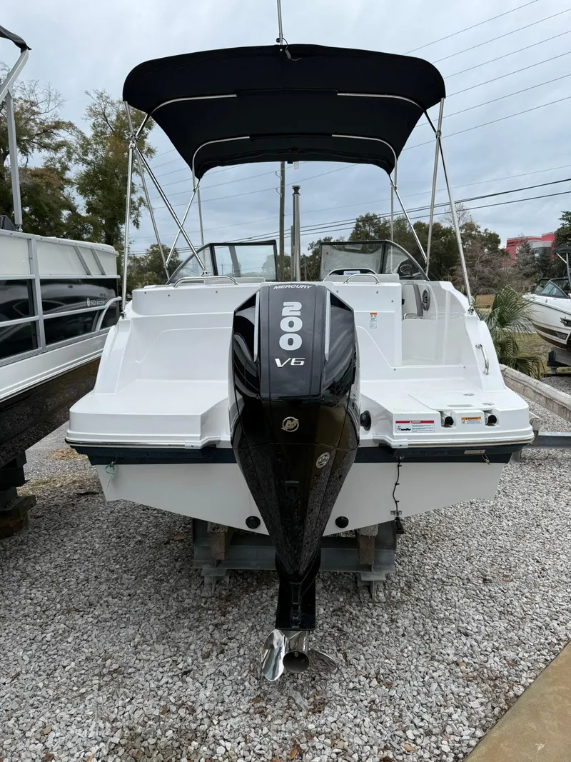 Slide: The Image of 2025 Hurricane SunDeck 235 OB boat displayed at Emerald Coast Marine. - 2
