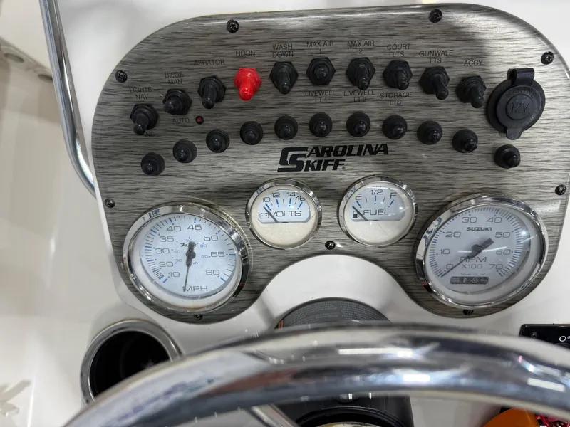 Slide: The Image of Dashboard of 2019 Carolina Skiff 19 Sea Chaser with gauges and controls. - 22