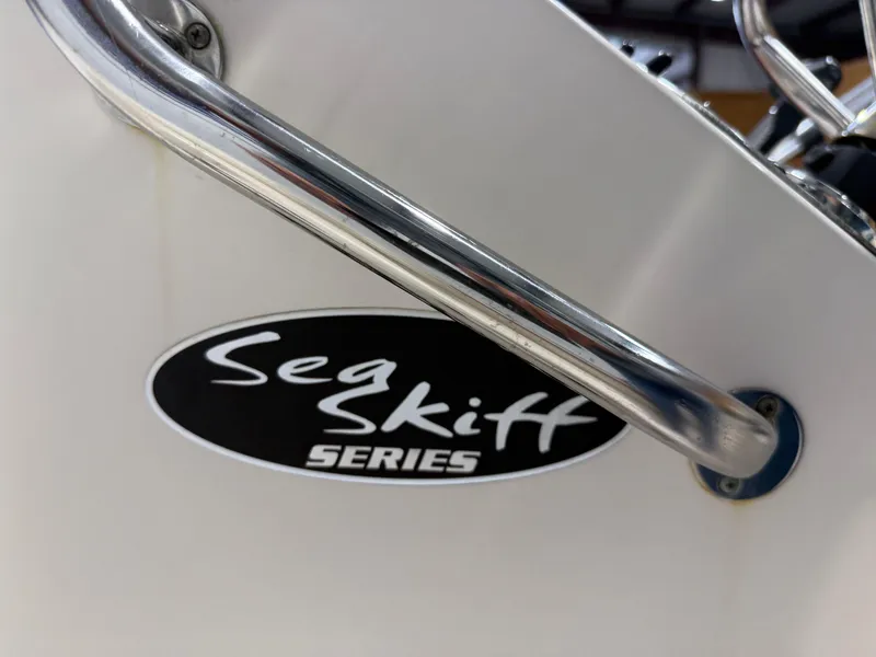 Slide: The Image of Close-up of 2019 Carolina Skiff 19 Sea Chaser logo and railing. - 24
