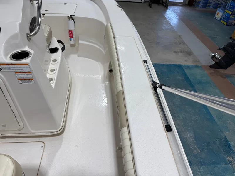 Slide: The Image of 2019 Carolina Skiff 19 Sea Chaser boat interior with console and safety equipment. - 30