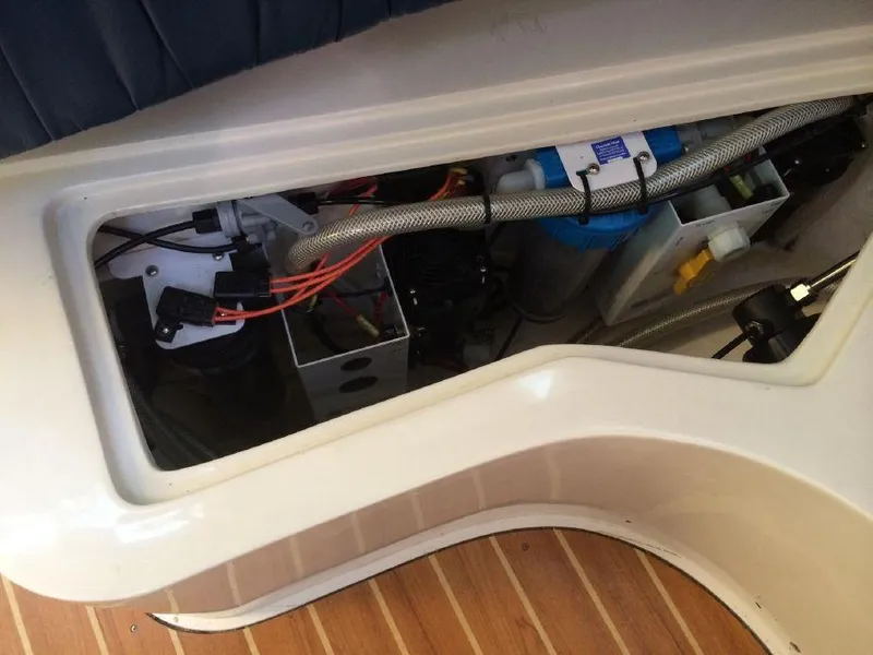 Slide: The Image of Electrical components inside a 2004 Catalina 42 MkII yacht compartment. - 17
