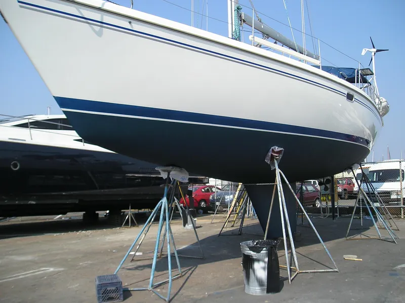 Slide: The Image of 2004 Catalina 42 MkII sailboat on stands in a boatyard. - 20