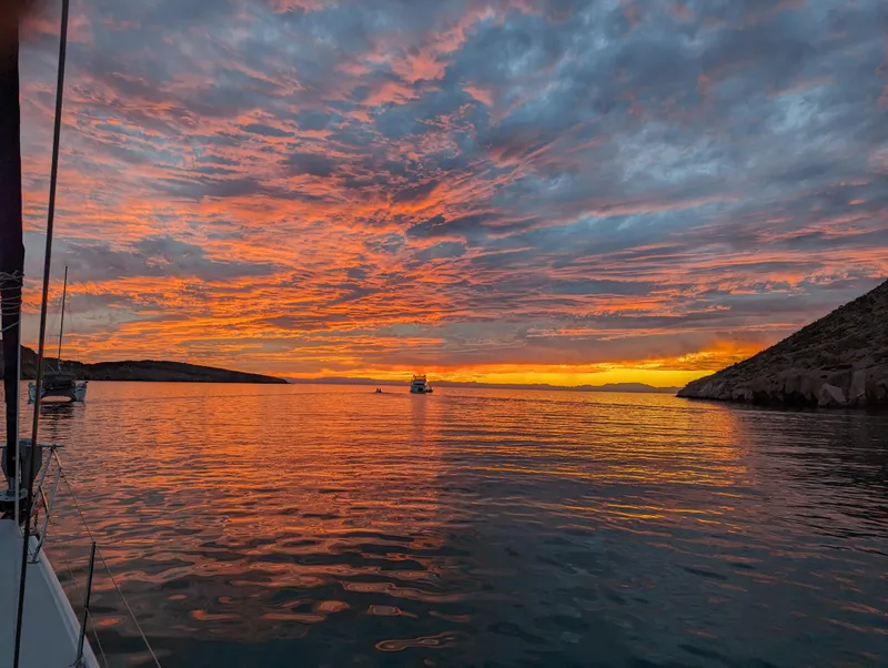 Slide: The Image of Sailboat on serene water at sunset, vibrant sky, Catalina 42 MkII, 2004. - 23