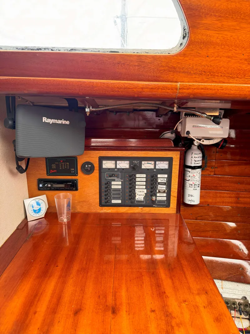 Slide: The Image of Interior of 1969 Ohlson 38 sailboat with navigation equipment and control panel. - 23