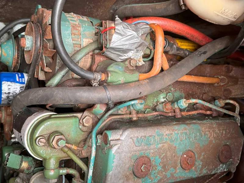 Slide: The Image of Engine of a 1969 Ohlson 38 sailboat, featuring Volvo Penta components. - 27