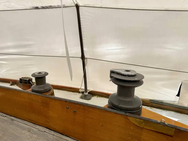 Slide: The Image of Ohlson 38 sailboat winches, 1969 model, under a protective cover. - 7