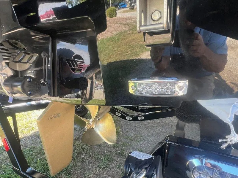 Slide: The Image of 2025 Malibu 23 LSV boat propeller and underwater lighting system. - 24