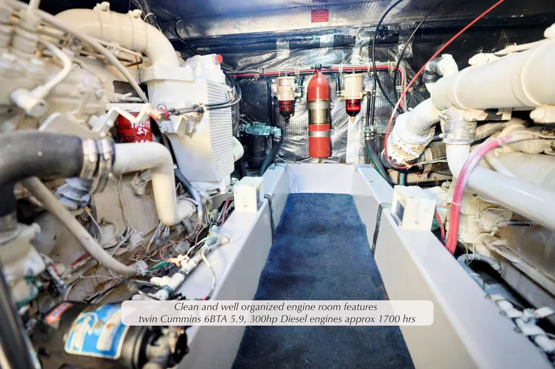 Slide: The Image of Engine room of 1988 Mediterranean 38 Convertible with twin Cummins diesel engines. - 23