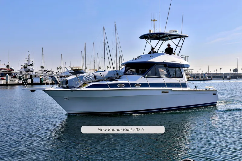 Slide: The Image of 1988 Mediterranean 38 Convertible yacht in marina, new bottom paint 2024. - 3
