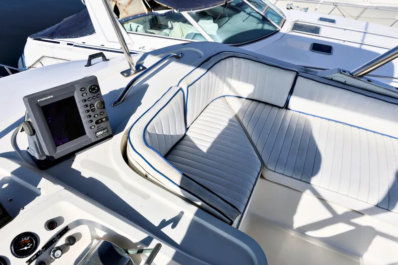 Slide: The Image of 1988 Mediterranean 38 Convertible yacht cockpit with seating and navigation equipment. - 5