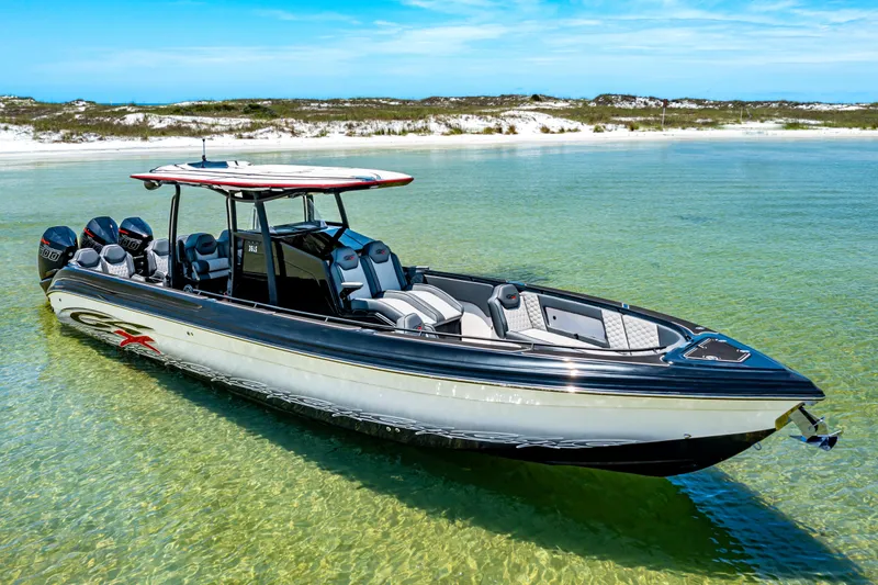 Slide: The Image of 2025 Glasstream GSX boat in clear water, showcasing sleek design and modern features. - 1