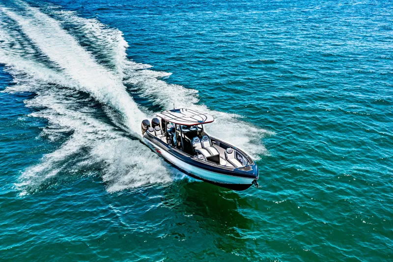Slide: The Image of 2025 Glasstream GSX boat speeding on clear blue water. - 11