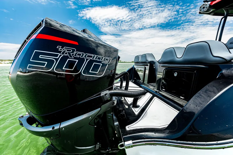 Slide: The Image of 2025 Glasstream GSX boat with Racing 500 engine on clear water. - 21