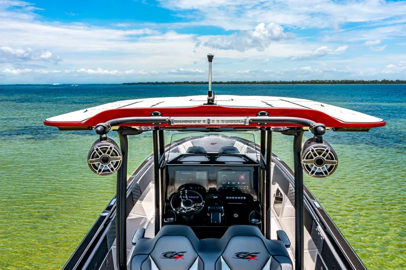 Slide: The Image of 2025 Glasstream GSX boat on clear water, showcasing modern design and technology. - 3