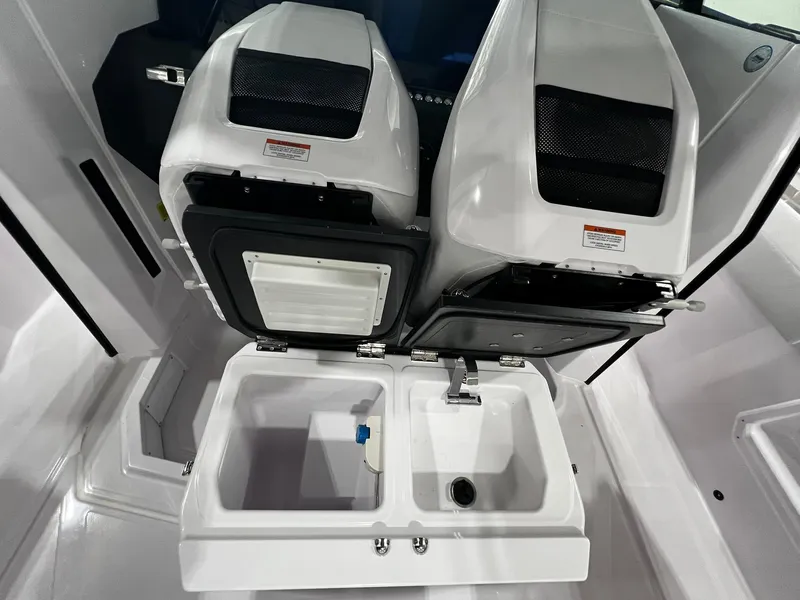 Slide: The Image of Interior view of 2025 Axopar 29 CCX boat cabin with modern design and lighting. - 28