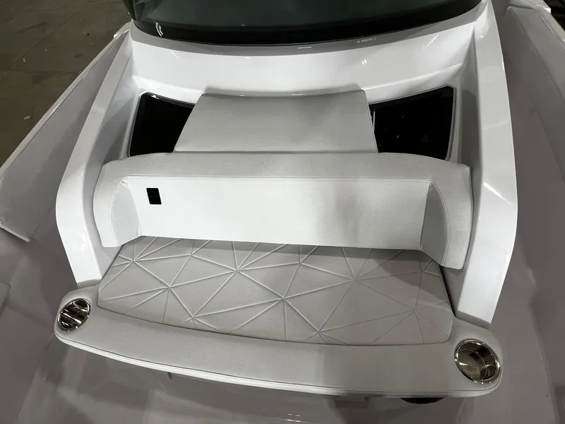 Slide: The Image of Interior of 2025 Axopar 29 CCX boat featuring a compact sink and cozy sleeping area. - 33