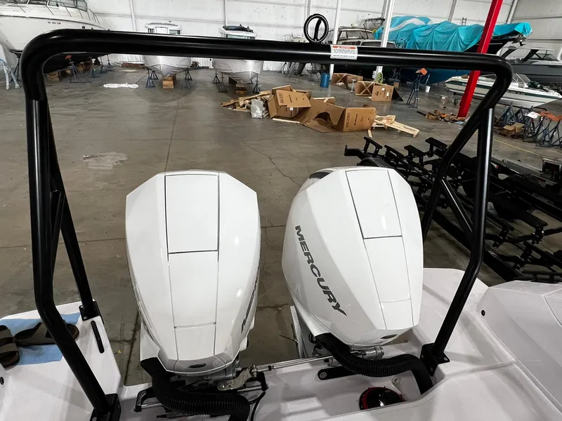 Slide: The Image of 2025 Axopar 29 CCX boat cockpit with modern steering and control panel. - 8