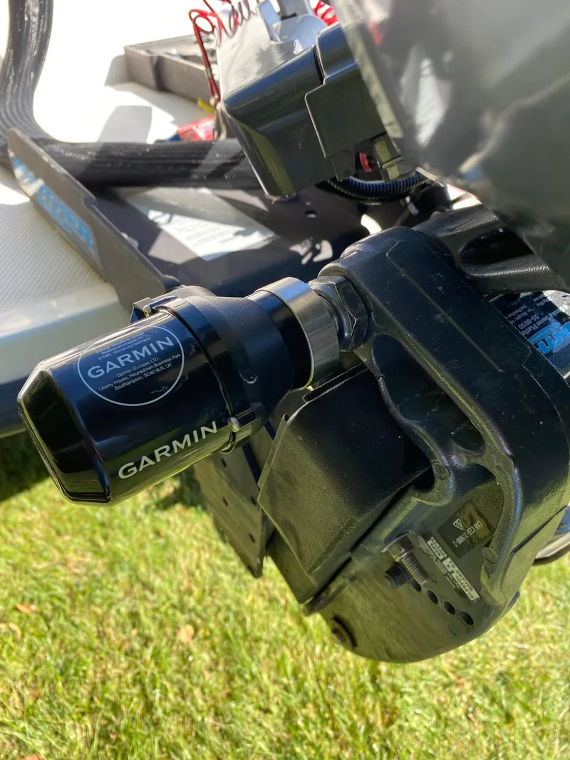 Slide: The Image of Garmin device on a 1996 Trophy 2352 Walkaround boat, close-up view. - 10