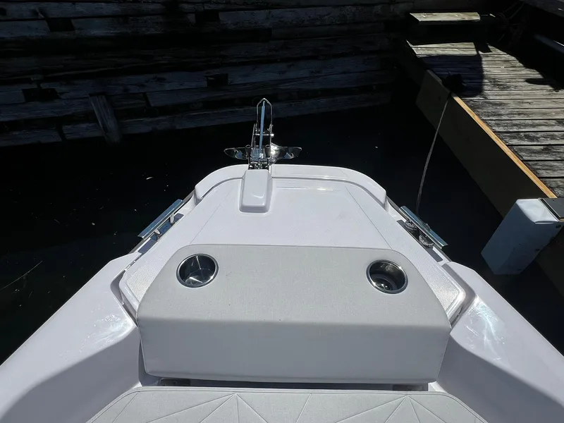 Slide: The Image of 2025 Axopar 29 CCX boat bow with sleek design and modern features. - 5